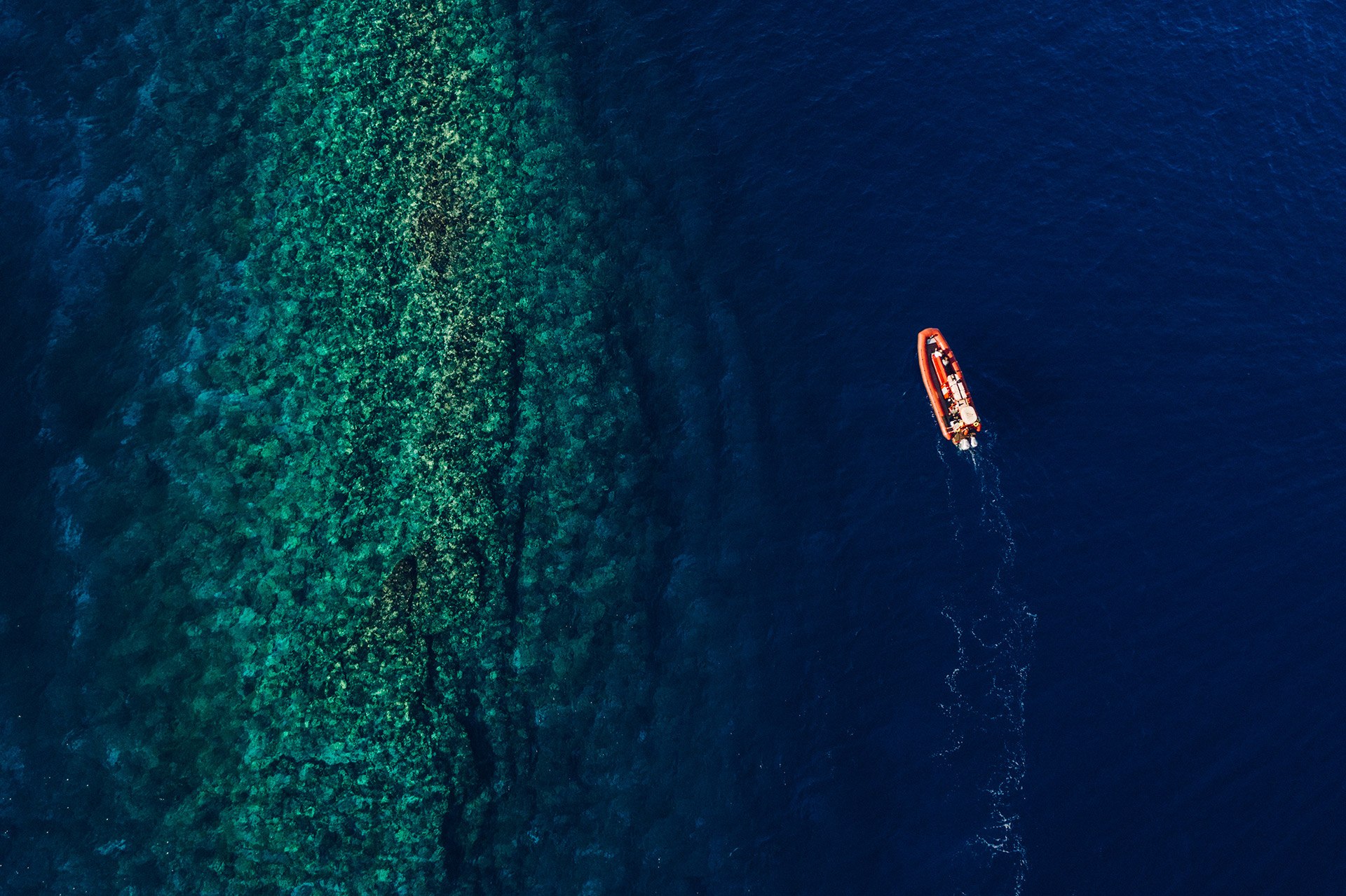 Redline Boat on The Ocean Pic
